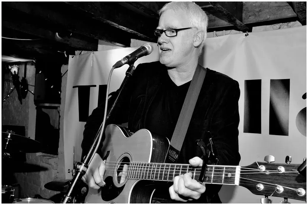 John E Wright performing